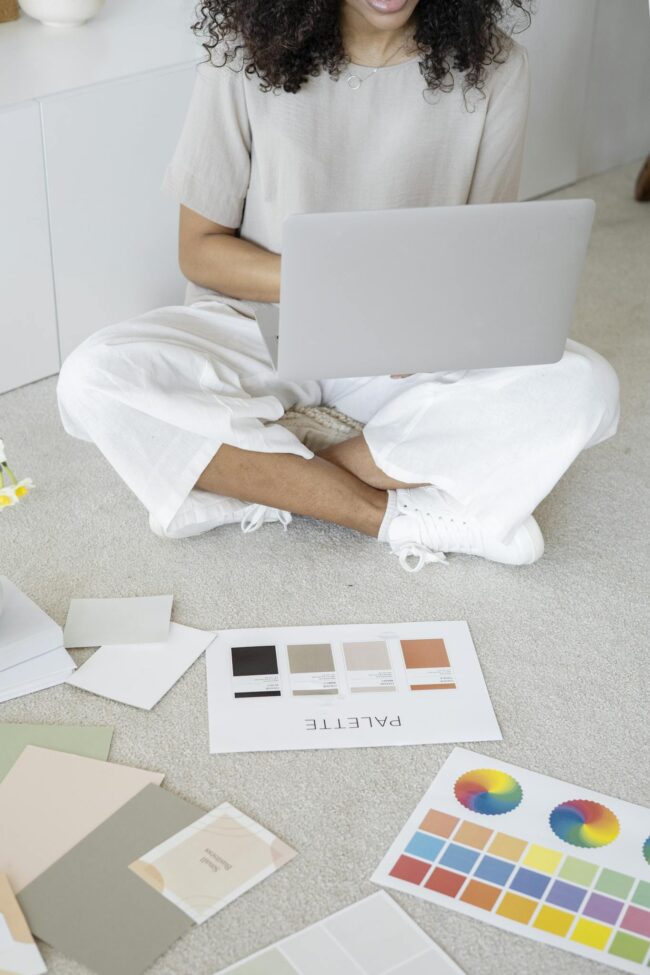 Photo by Anna Nekrashevich Person in White Scrub Suit Sitting on White Couch